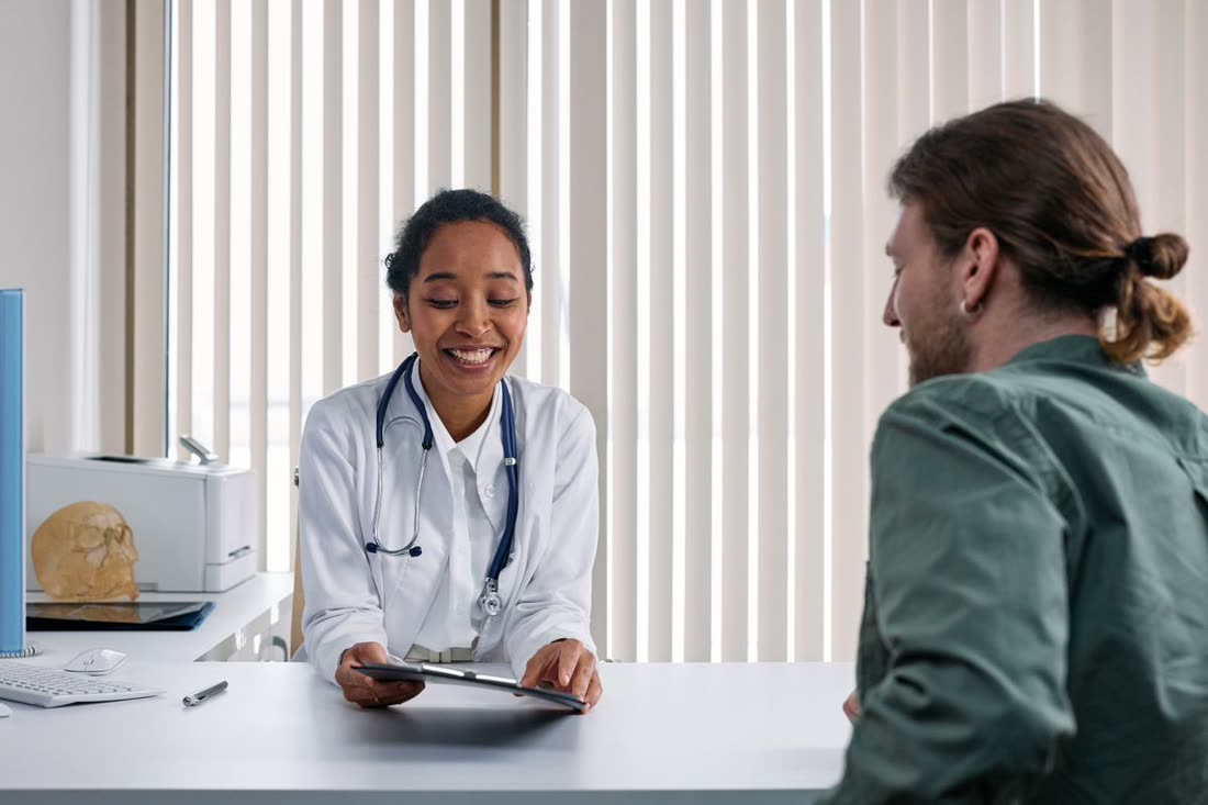 A concierge doctor reviewing care with a patient